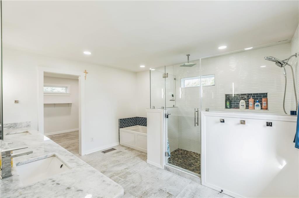 500 Coleman Mill Road Carrollton, GA 30116 - Photo 22 of 83 a bathroom with a tub and shower