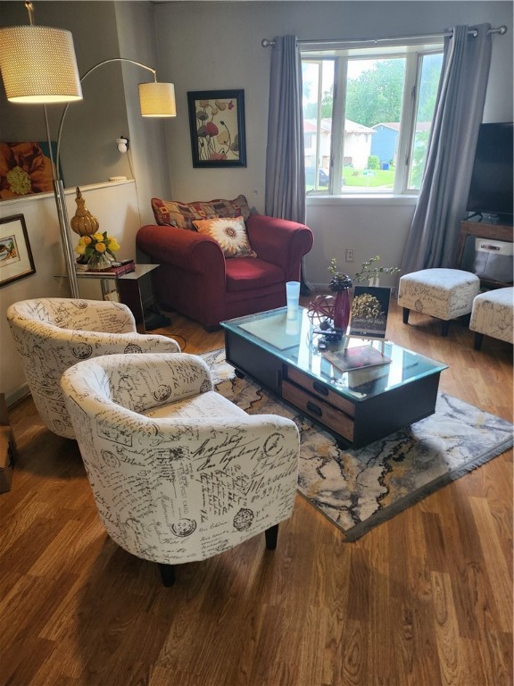 3264 East Bluebird Drive Decatur, IL 62526 - Photo 6 of 26 a living room with furniture and a wooden floor