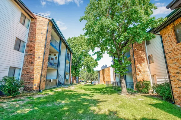 a view of a back yard of the house