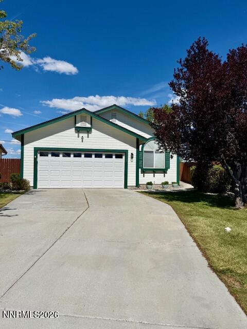1147 White Oak Loop Minden, NV 89423 - Photo 1 of 23 a view of a house with a yard and garage