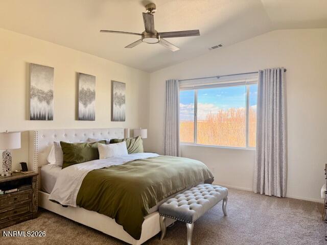 1147 White Oak Loop Minden, NV 89423 - Photo 11 of 23 a bedroom with a bed and ceiling fan