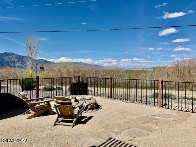 1147 White Oak Loop Minden, NV 89423 - Photo 18 of 23 a view of a terrace with a bench