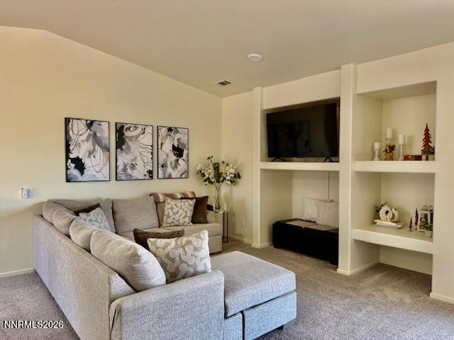 1147 White Oak Loop Minden, NV 89423 - Photo 5 of 23 a living room with furniture and a flat screen tv