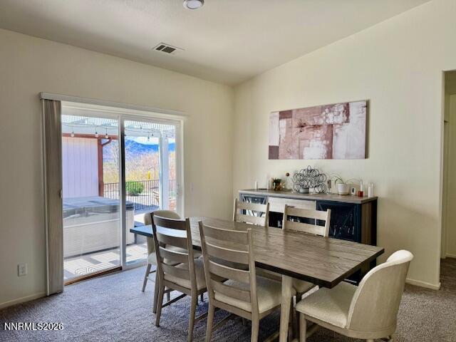 1147 White Oak Loop Minden, NV 89423 - Photo 7 of 23 a dining room with furniture and window