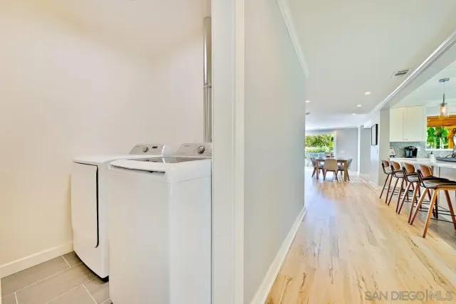 a bathroom with a sink a mirror and a toilet