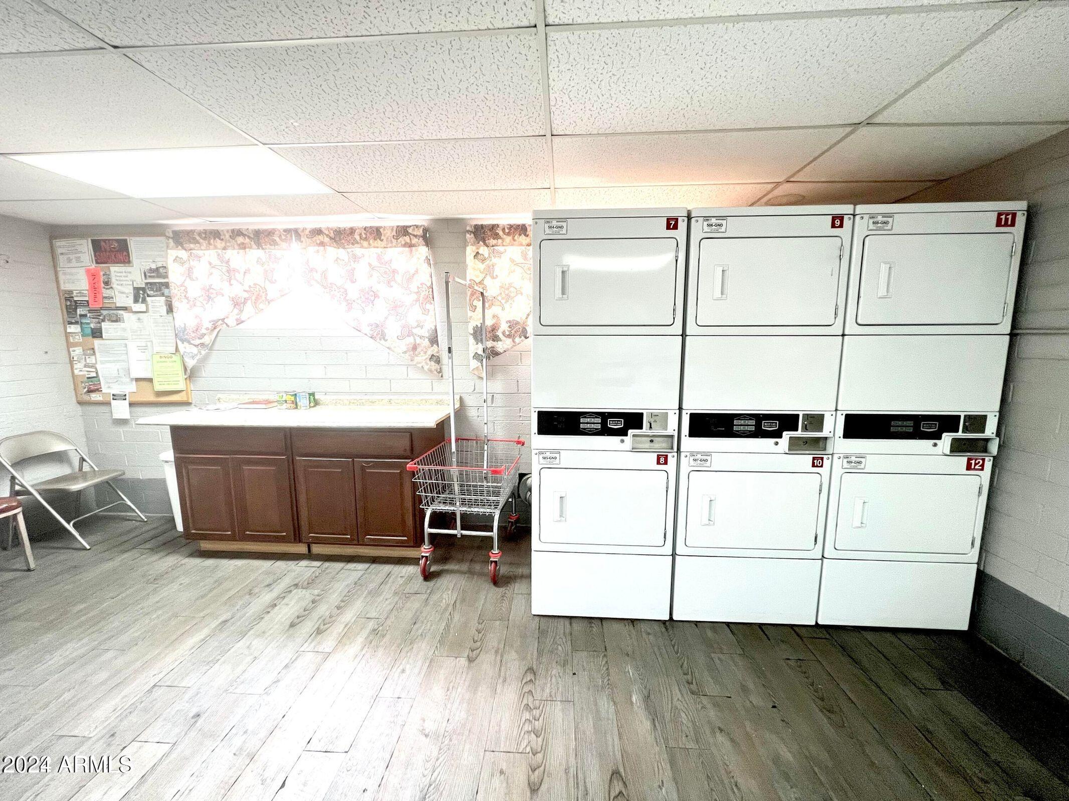16005 North 32nd Street, Unit 33 Phoenix, AZ 85032 - Photo 40 of 40 a view of cabinets and wooden floor