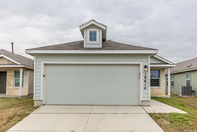 a front view of house with yard