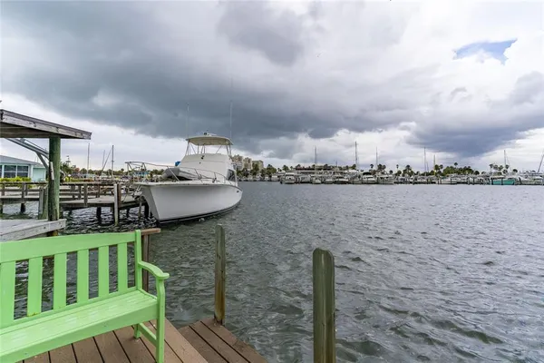 an aerial view of a house with a swimming pool