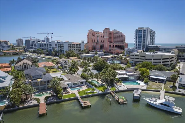 an aerial view of residential house with outdoor space and swimming pool