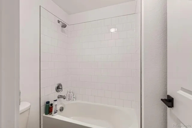 a bathroom with a bathtub
