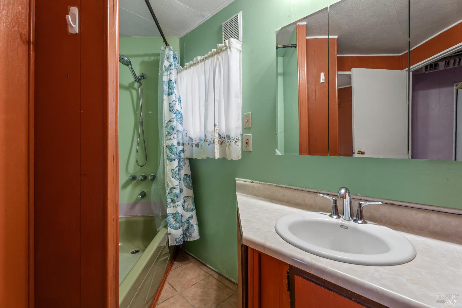 4080 Burke Hill Road, Unit 4 Ukiah, CA 95482 - Photo 11 of 19 a bathroom with a sink and a mirror