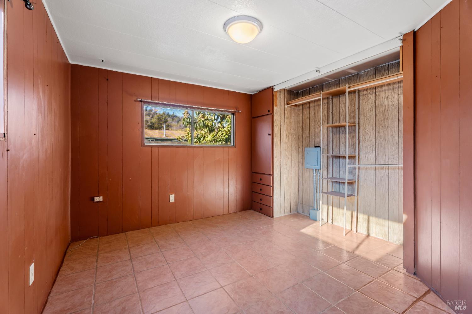 4080 Burke Hill Road, Unit 4 Ukiah, CA 95482 - Photo 13 of 19 an empty room with windows and closet