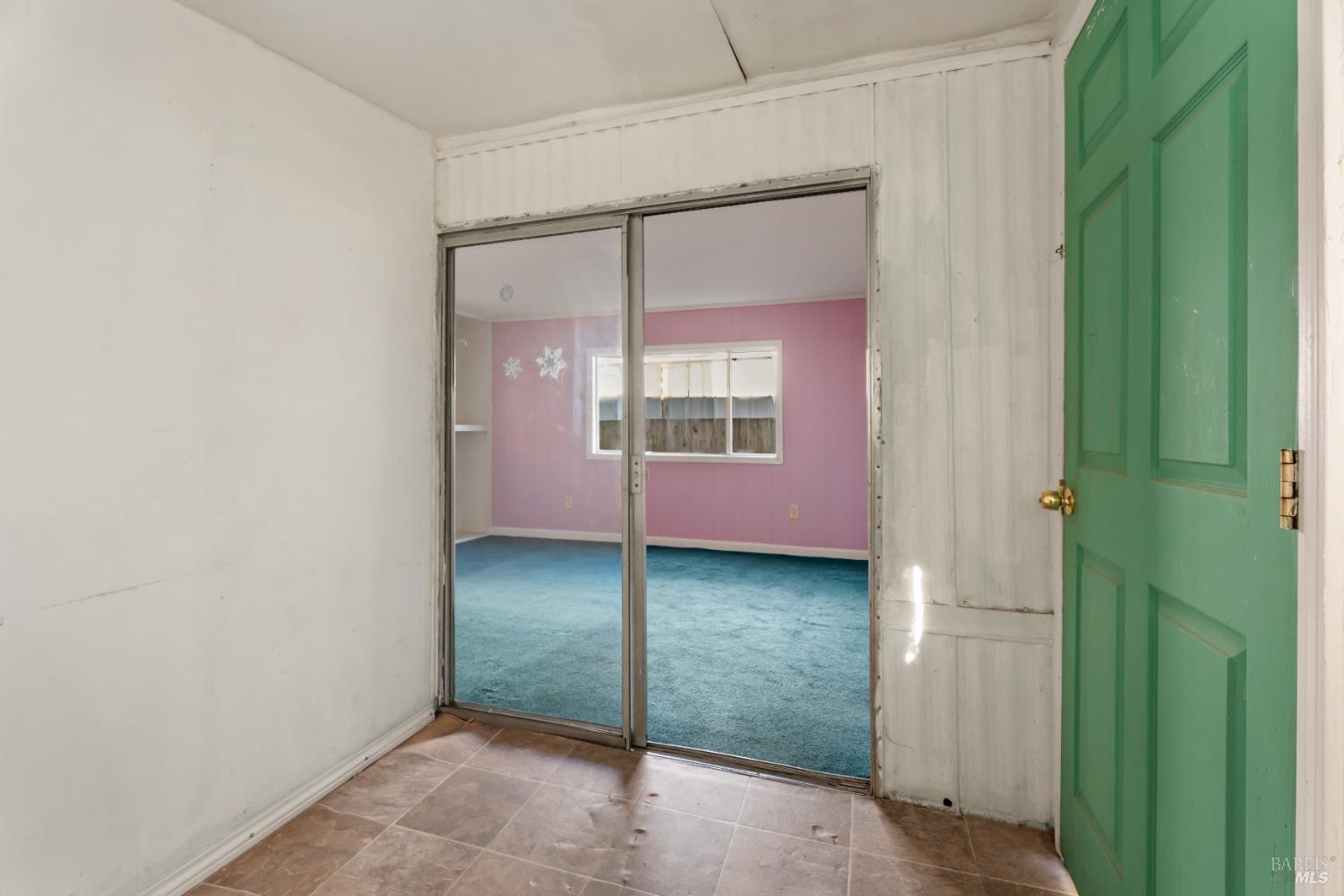 4080 Burke Hill Road, Unit 4 Ukiah, CA 95482 - Photo 17 of 19 an empty room with windows and closet