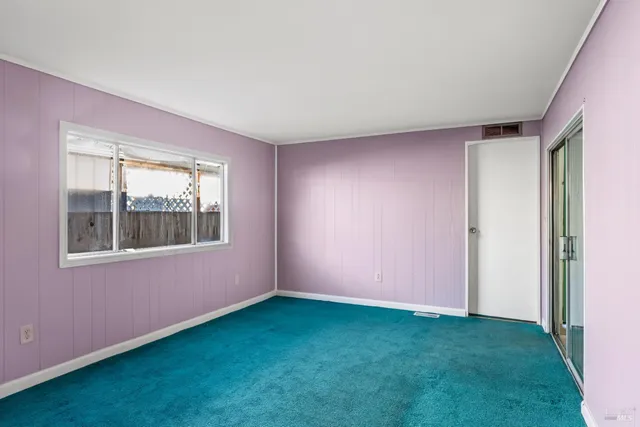 a view of an empty room with window