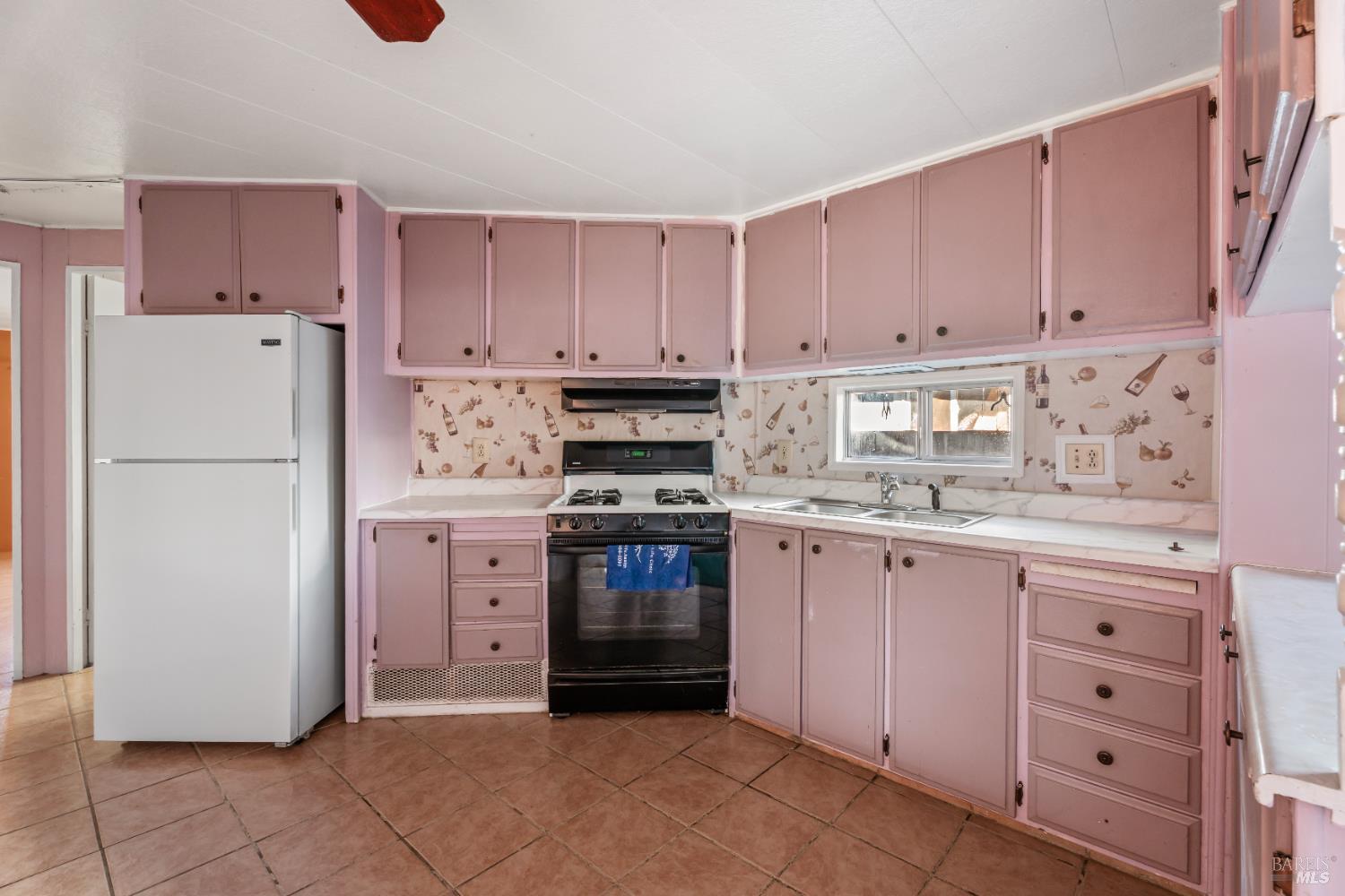4080 Burke Hill Road, Unit 4 Ukiah, CA 95482 - Photo 7 of 19 a kitchen with cabinets stainless steel appliances and a counter space