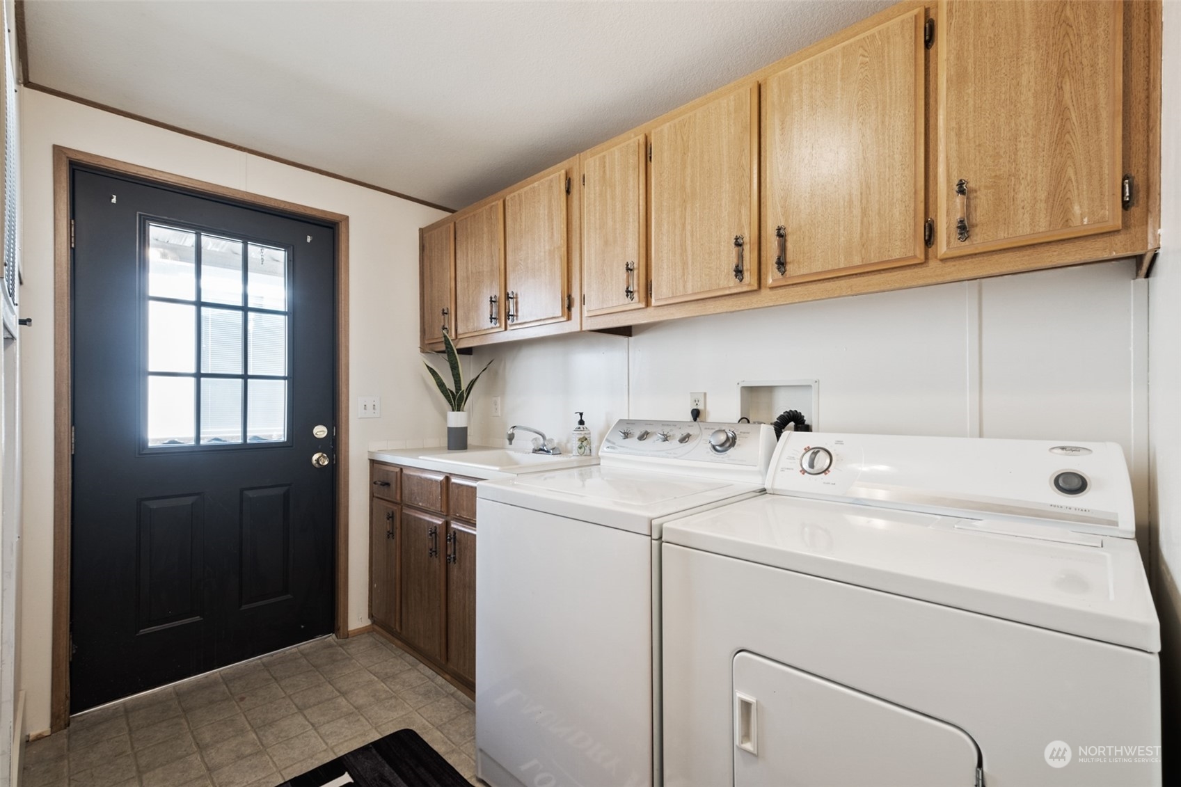 798 Pine Drive, Unit 798 Enumclaw, WA 98022 - Photo 18 of 20 a utility room with dryer and washer