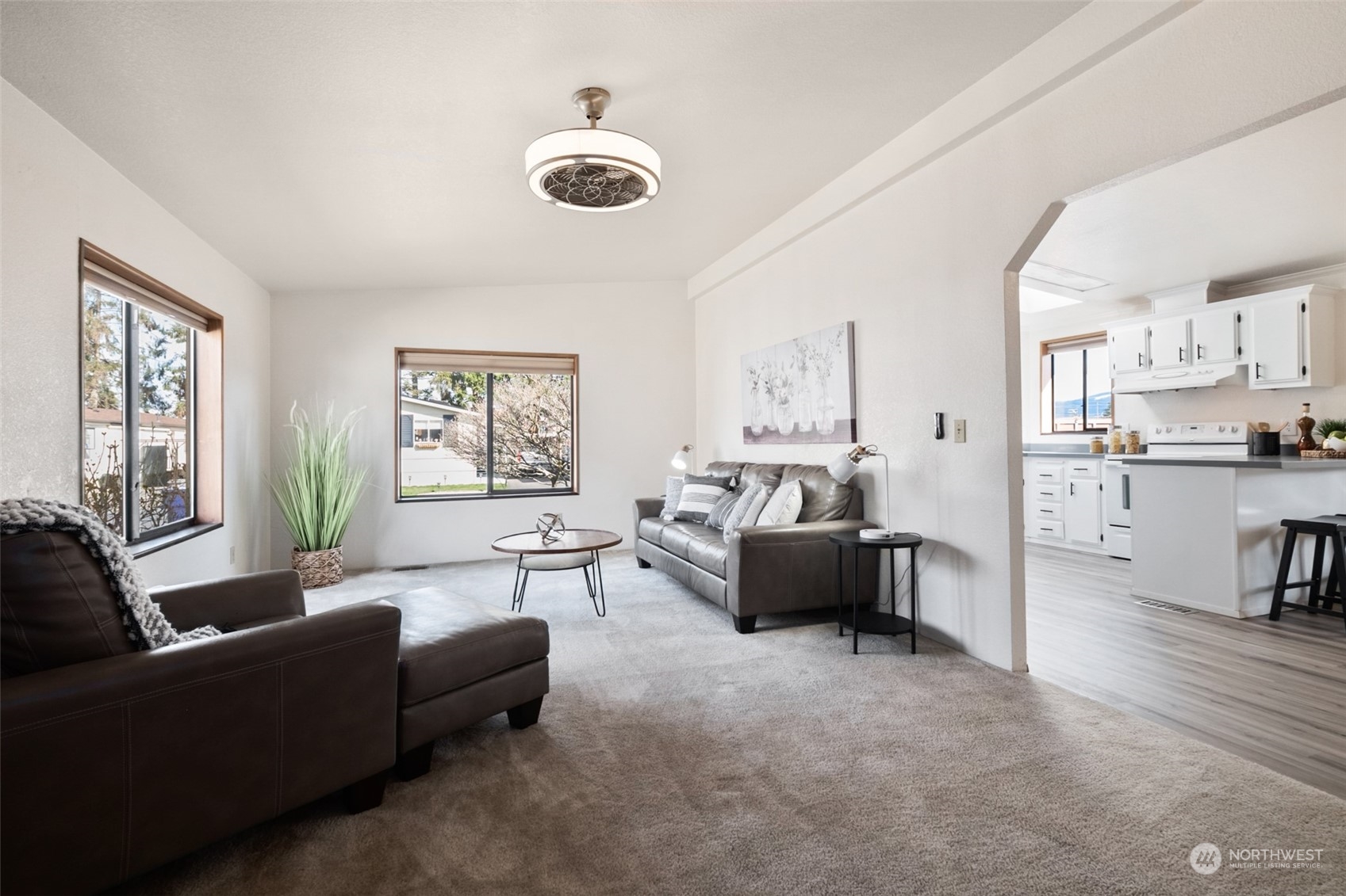 798 Pine Drive, Unit 798 Enumclaw, WA 98022 - Photo 6 of 20 a living room with furniture and a large window