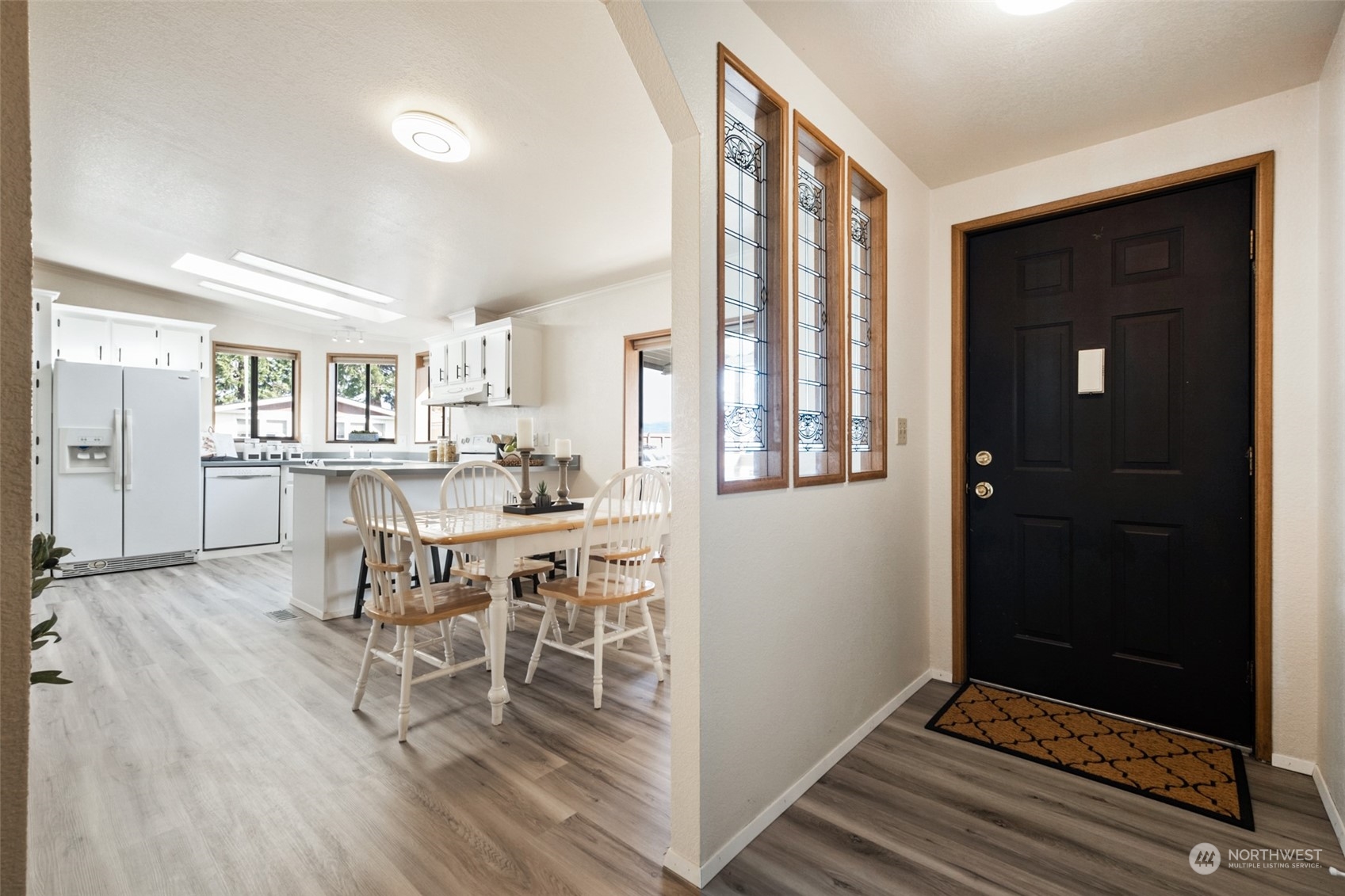 798 Pine Drive, Unit 798 Enumclaw, WA 98022 - Photo 7 of 20 a dining room with furniture and window