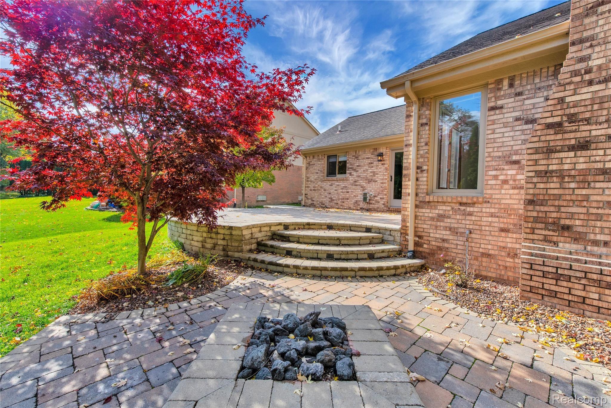 1239 Bembridge Drive Rochester, MI 48307 - Photo 29 of 33 patio with built in fire pit