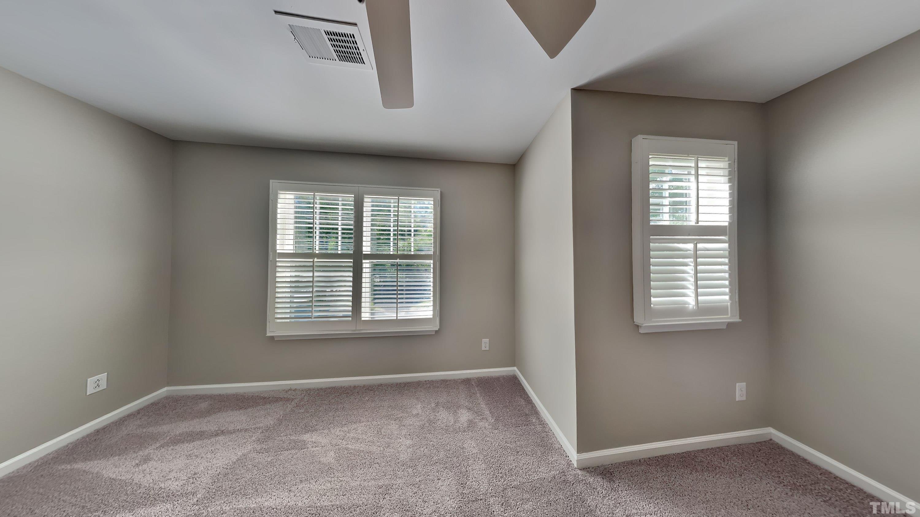 2 Water Garden Way Durham, NC 27713 - Photo 11 of 16 an empty room with a window
