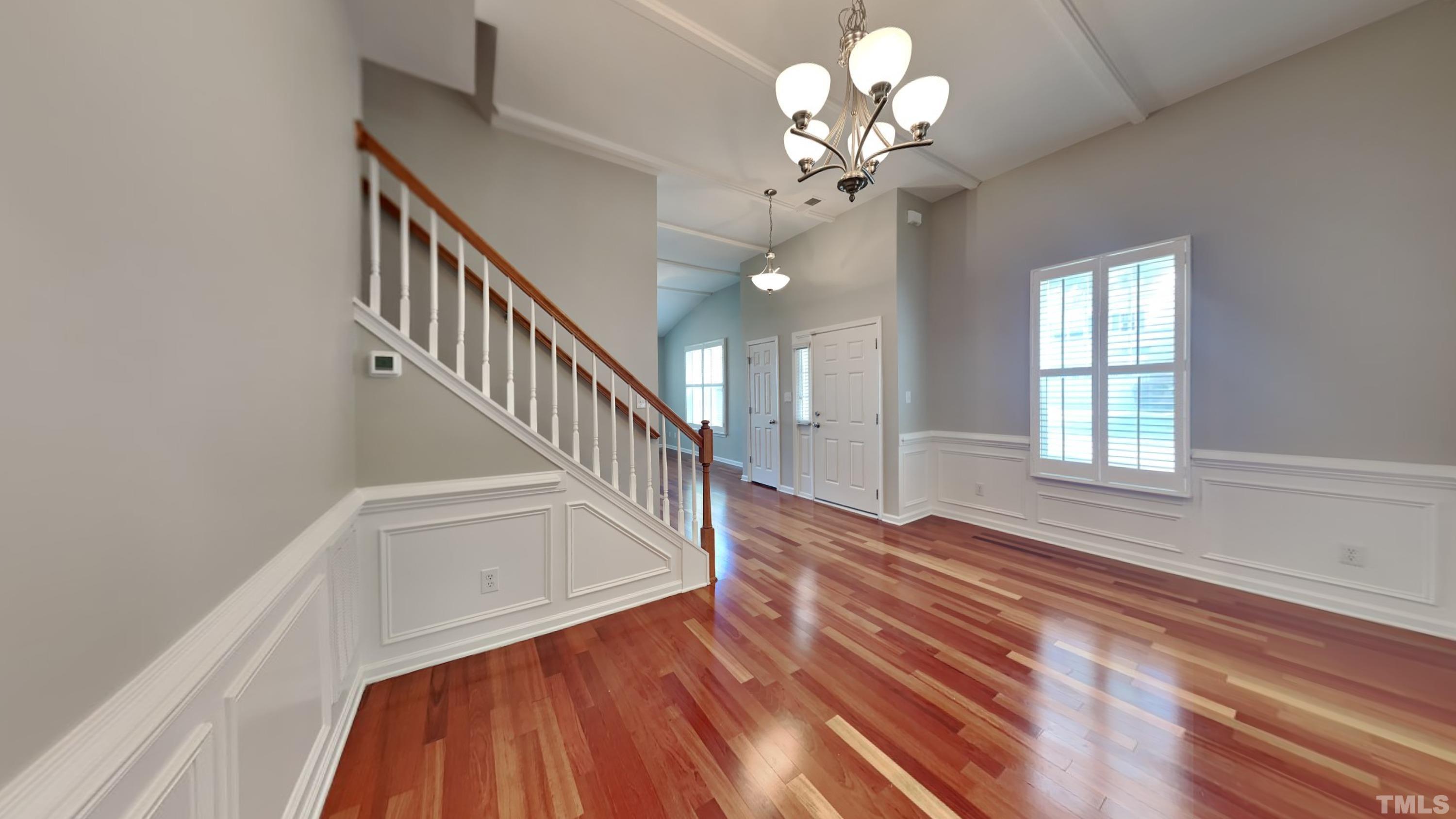 2 Water Garden Way Durham, NC 27713 - Photo 4 of 16 wooden floor in an empty room with a window