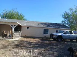 a front view of a house with parking