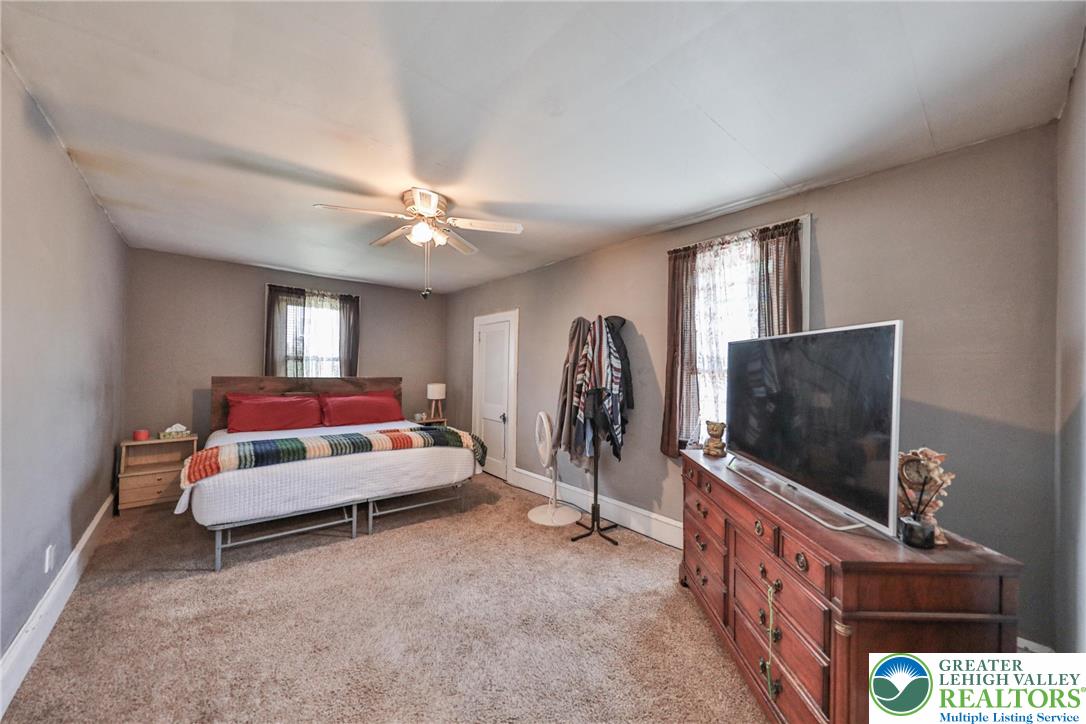 417 3rd Street Lehighton, PA 18235 - Photo 13 of 39 A well-proportioned bedroom with ample space, offering comfort and tranquility.