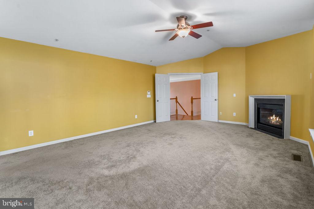 14701 Danton Court Bowie, MD 20721 - Photo 27 of 60 a view of empty room with a fireplace