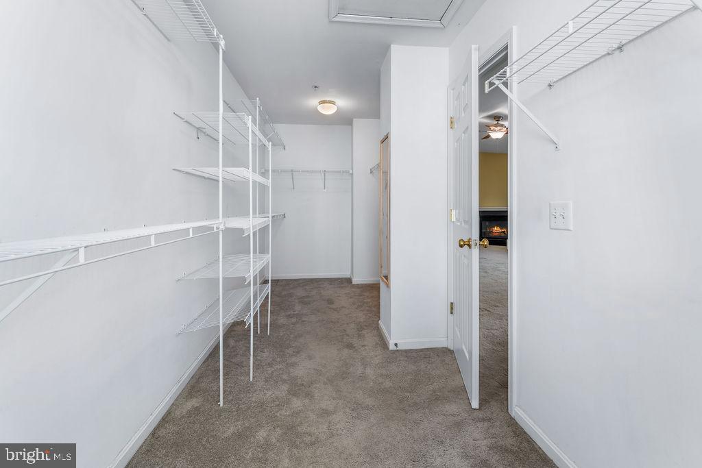 14701 Danton Court Bowie, MD 20721 - Photo 32 of 60 a view of walk in closet with empty racks