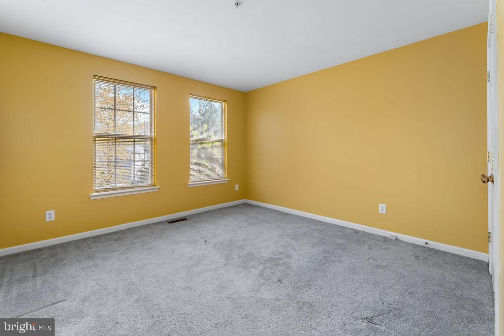 14701 Danton Court Bowie, MD 20721 - Photo 40 of 60 a view of an empty room with a window