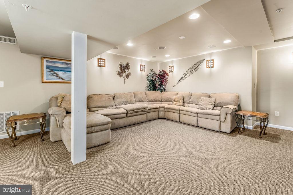 14701 Danton Court Bowie, MD 20721 - Photo 45 of 60 a living room with furniture and a couch