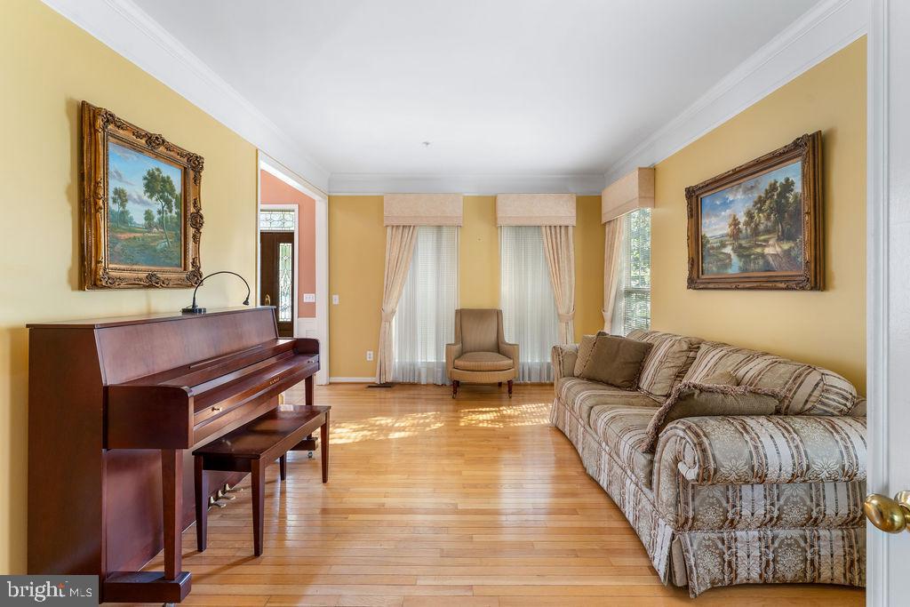 14701 Danton Court Bowie, MD 20721 - Photo 8 of 60 a living room with furniture and a piano