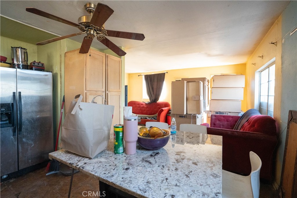 6174 Jurupa Avenue Riverside, CA 92504 - Photo 17 of 30 a living room with furniture and a window