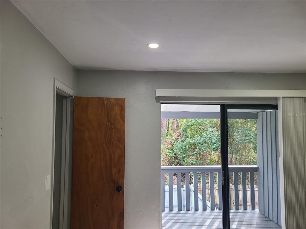 4123 Southwest 15 Place, Unit 2 Gainesville, FL 32607 - Photo 8 of 14 a view of a porch