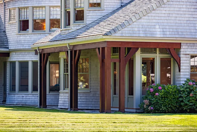 a kitchen with sink stove and cabinets