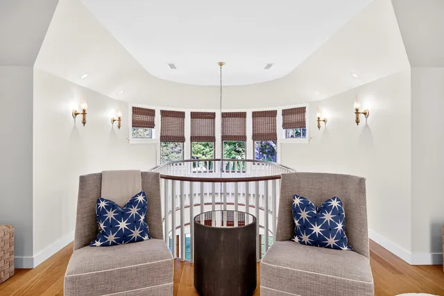 a view of a yard with plants and trees