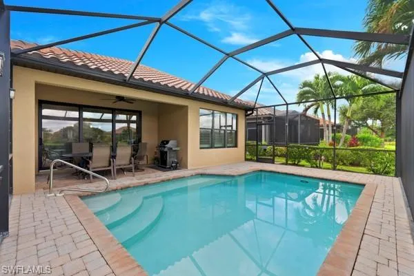 a view of a backyard with a patio and a garden