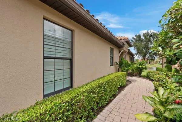 a backyard of a house with lots of green space