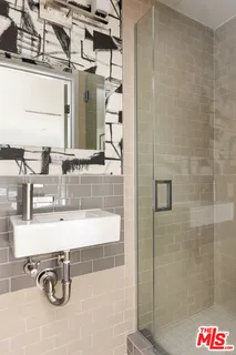 a view of a patio with swimming pool table and chairs