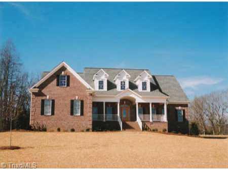 8406 Linville Oaks Drive Oak Ridge, NC 27310 - Photo 1 of 1 Exterior Front. Front of the Home