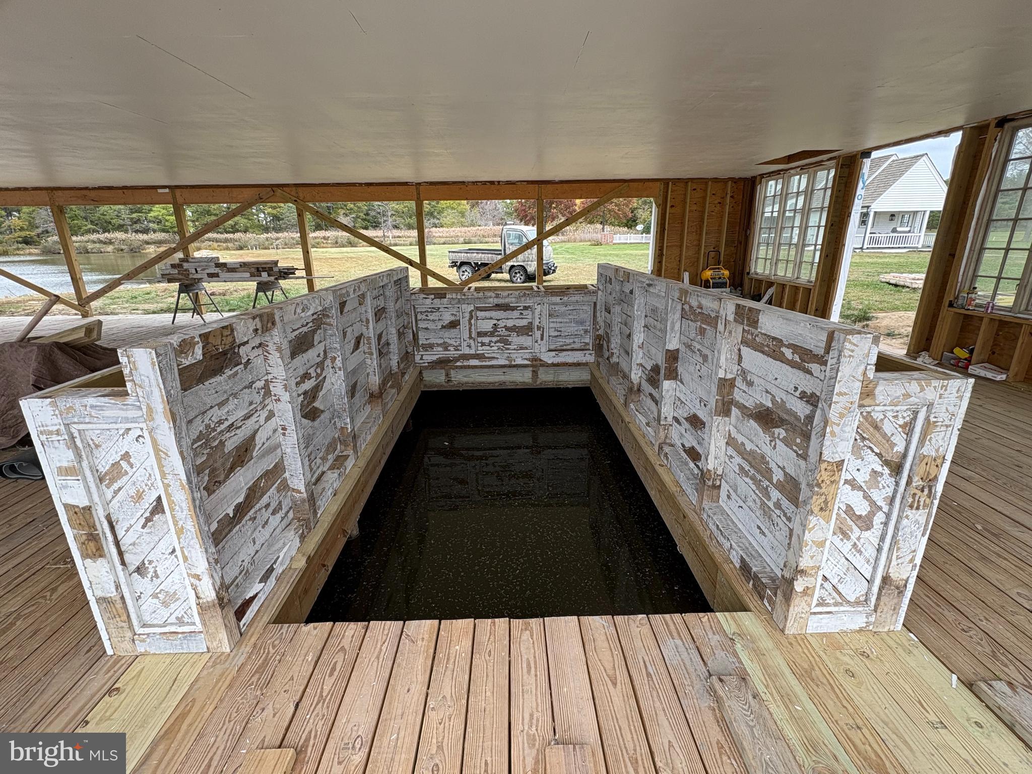 964 Taylors Island Road Madison, MD 21648 - Photo 103 of 106 Fish in the pond while sitting at the bar