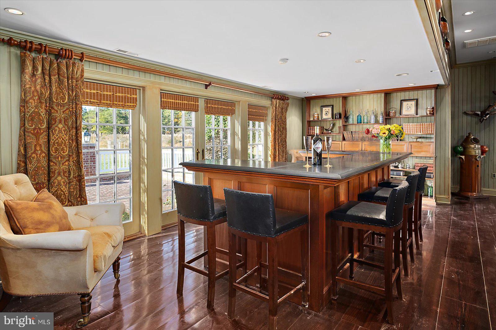 964 Taylors Island Road Madison, MD 21648 - Photo 15 of 106 Bar with adjoining living room