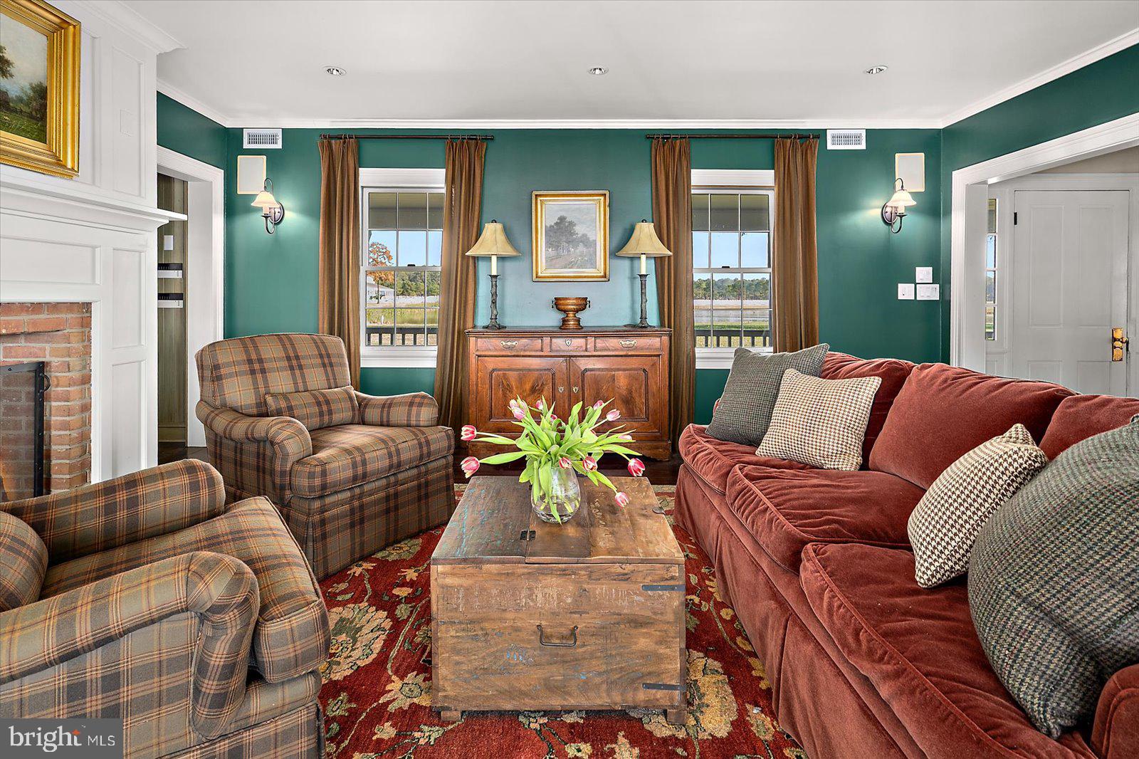 964 Taylors Island Road Madison, MD 21648 - Photo 17 of 106 a living room with furniture and a large window