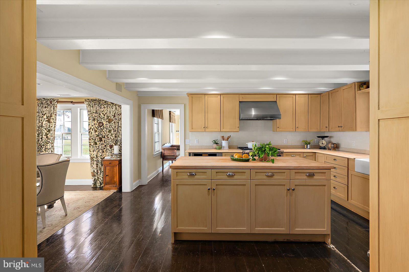 964 Taylors Island Road Madison, MD 21648 - Photo 19 of 106 a kitchen with a sink stove and cabinets