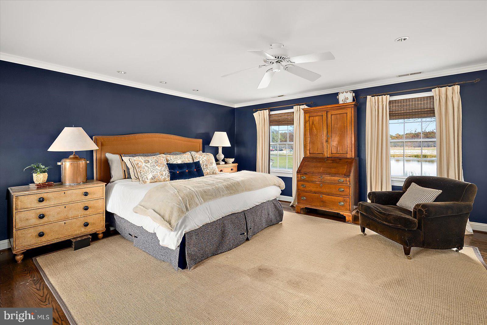 964 Taylors Island Road Madison, MD 21648 - Photo 24 of 106 a bedroom with a bed and a couch