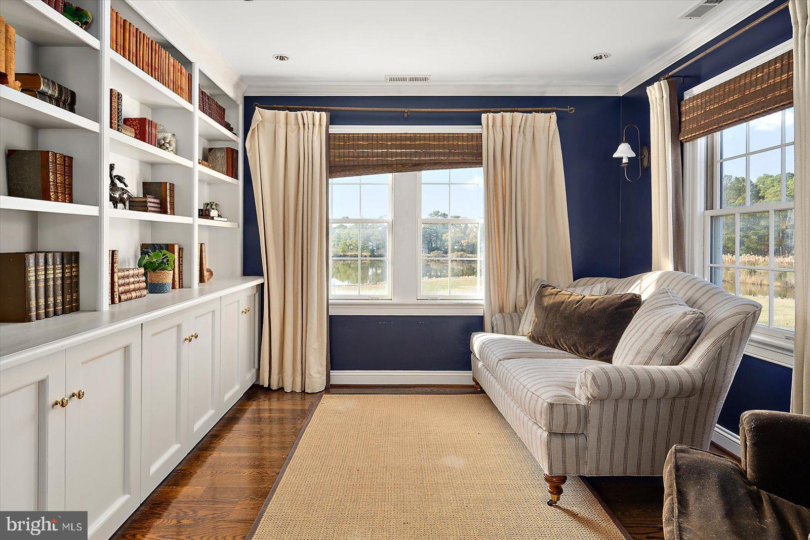 964 Taylors Island Road Madison, MD 21648 - Photo 25 of 106 a living room with furniture and a large window