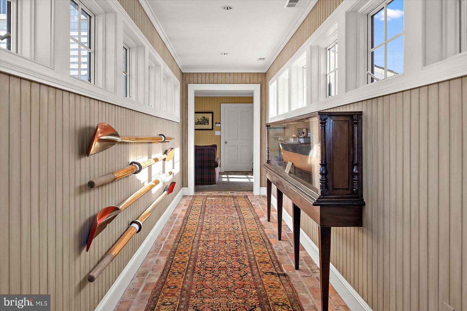 964 Taylors Island Road Madison, MD 21648 - Photo 32 of 106 a view of a balcony with wooden floor and stairs