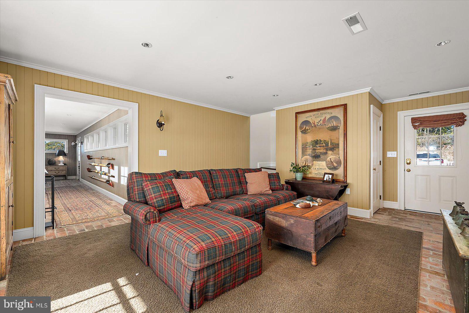 964 Taylors Island Road Madison, MD 21648 - Photo 33 of 106 a living room with furniture and a couch