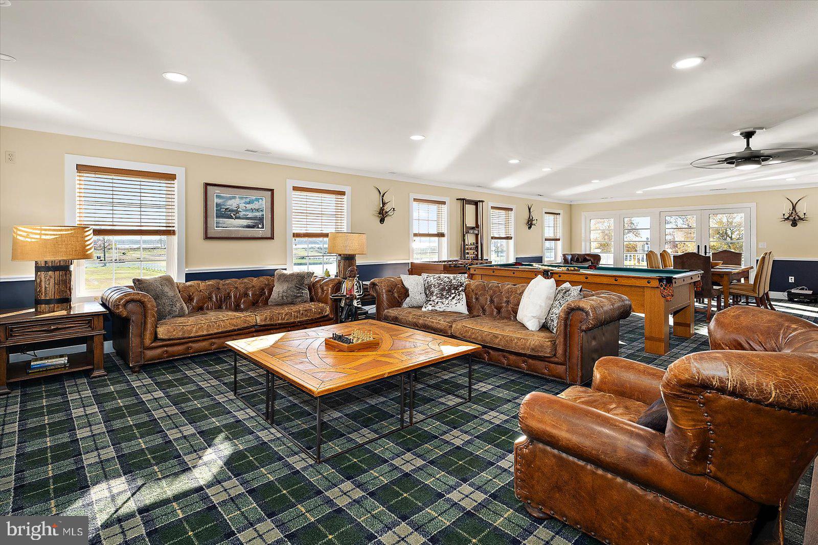 964 Taylors Island Road Madison, MD 21648 - Photo 56 of 106 a living room with furniture a table and a window