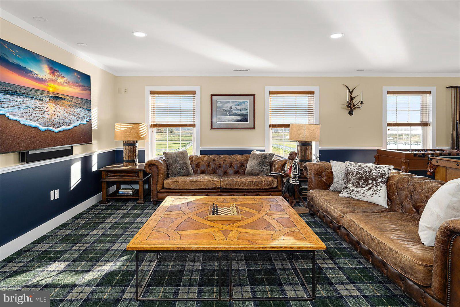 964 Taylors Island Road Madison, MD 21648 - Photo 57 of 106 a living room with furniture and a flat screen tv